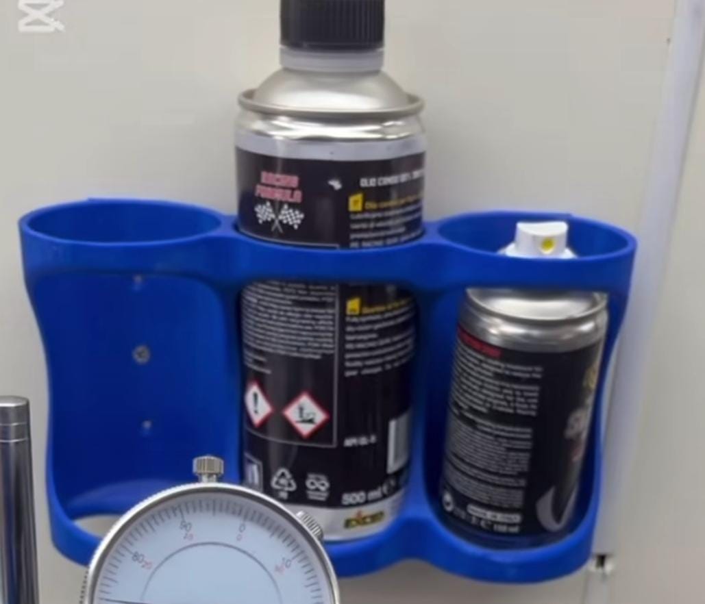 Porta bombolette spray